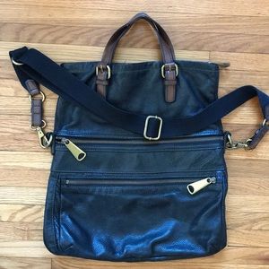 Fossil crossbody black and brown leather purse.